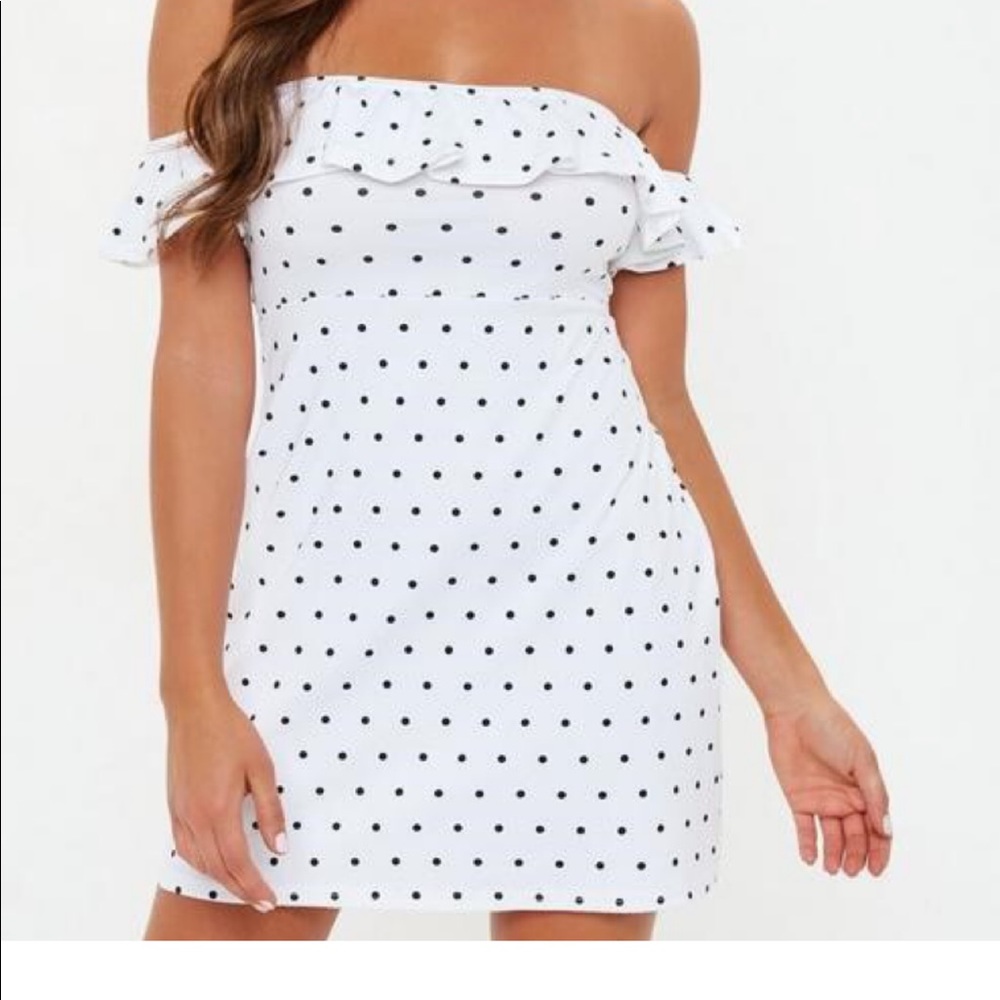 White polka dotted off the shoulder dress